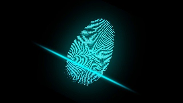 Image of a fingerprint on a computer screen, representing how artificial intelligence in cyber security is becoming an affordable option to help protect small businesses.